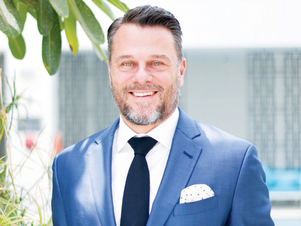  Economou promoted to Regional GM